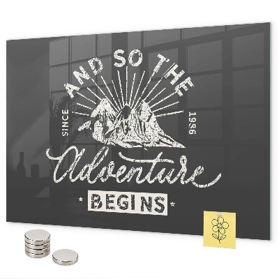 Magnetic board with quote about adventure