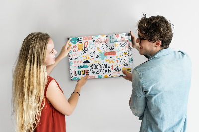 Magnetic board with pictures of sketches