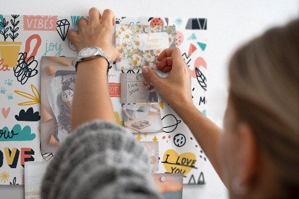 Magnetic board with pictures of sketches