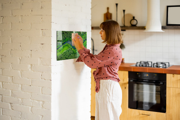 Magnetic board for wall featuring a river in the forest design