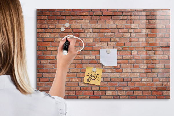 Dry erase board magnetic A note board on a brick wall