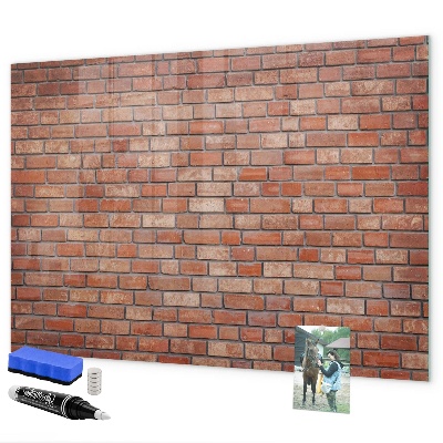 Dry erase board magnetic A note board on a brick wall