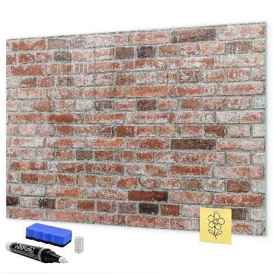 Dry erase board magnetic Photo board on a brick wall