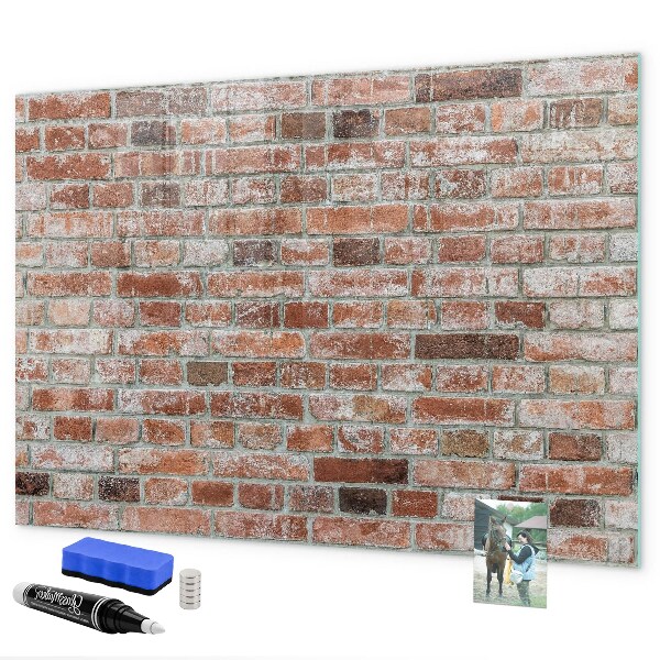 Dry erase board magnetic Photo board on a brick wall