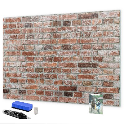 Dry erase board magnetic Photo board on a brick wall