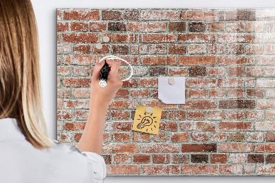 Dry erase board magnetic Photo board on a brick wall