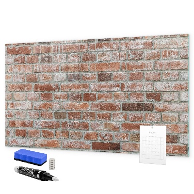 Dry erase board magnetic Photo board on a brick wall