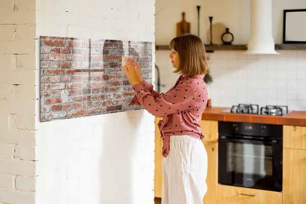 Dry erase board magnetic Photo board on a brick wall