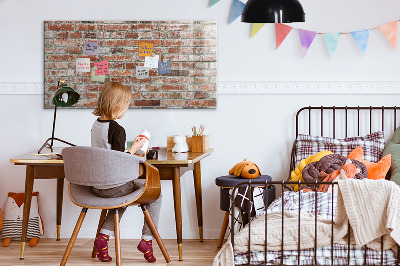 Dry erase board magnetic Photo board on a brick wall