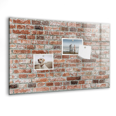 Dry erase board magnetic Photo board on a brick wall
