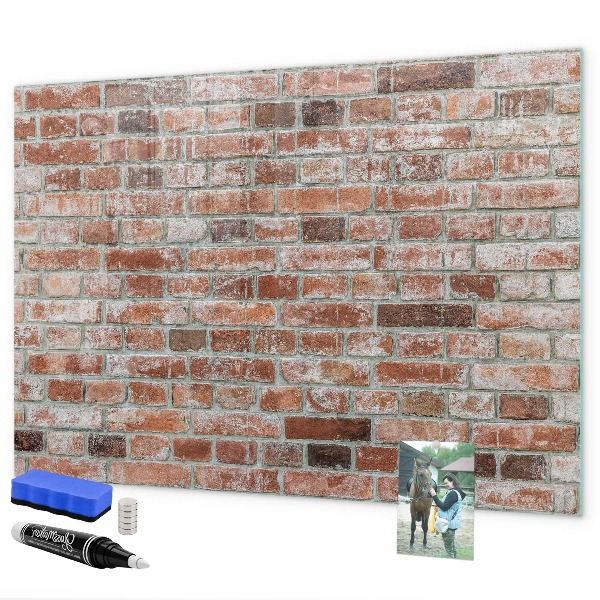 Dry erase board magnetic Photo board on a brick wall