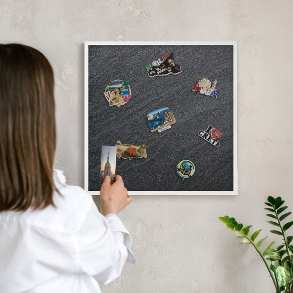 Decorative magnet board with a white frame Gray texture