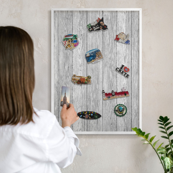 Decorative magnet board with a white frame Wooden texture