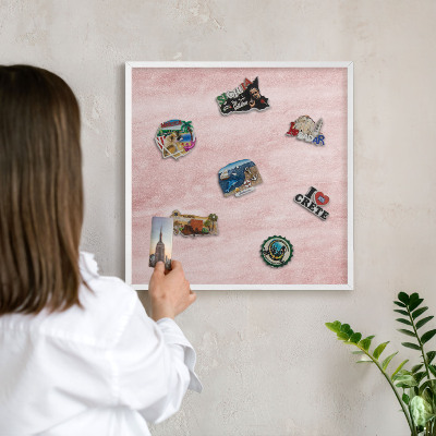 Decorative magnet board with a white frame Pink texture