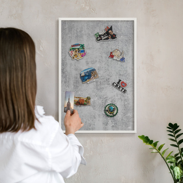Magnetic board for travel magnets in a white frame Gray surface