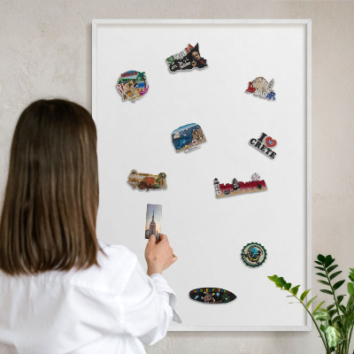 Magnetic board for travel magnets in a white frame Pure white