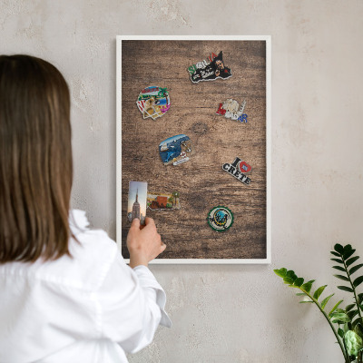 Decorative magnet board with a white frame Wooden texture