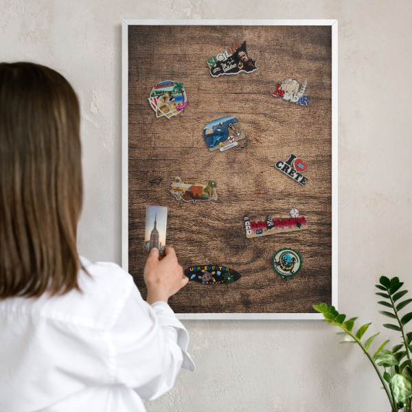Decorative magnet board with a white frame Wooden texture
