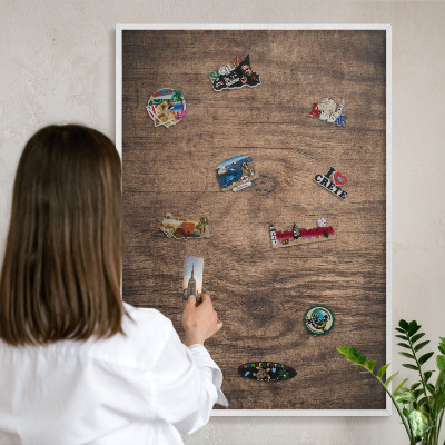 Decorative magnet board with a white frame Wooden texture