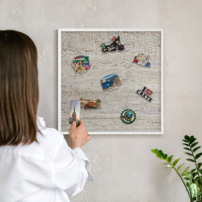 Decorative magnet board with a white frame Wooden texture
