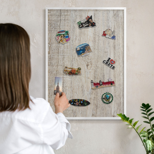 Decorative magnet board with a white frame Wooden texture