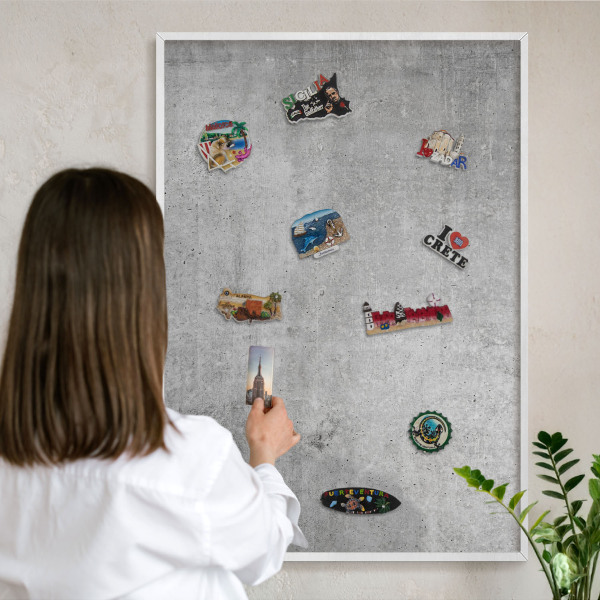 Magnetic board for travel magnets in a white frame Concrete minimalism
