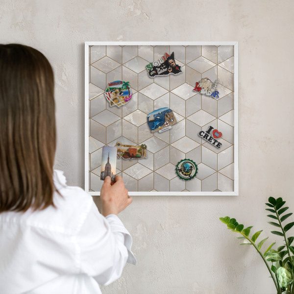 Magnetic board for travel magnets in a white frame Cubic background
