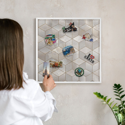 Magnetic board for travel magnets in a white frame Cubic background