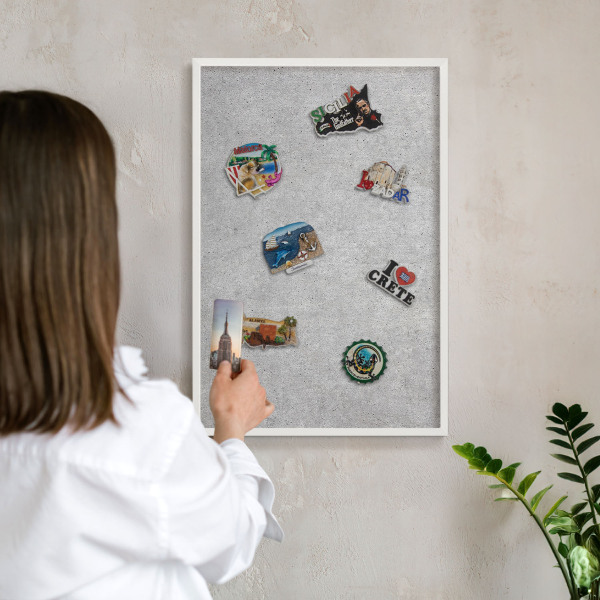 Decorative magnet board with a white frame Gray texture