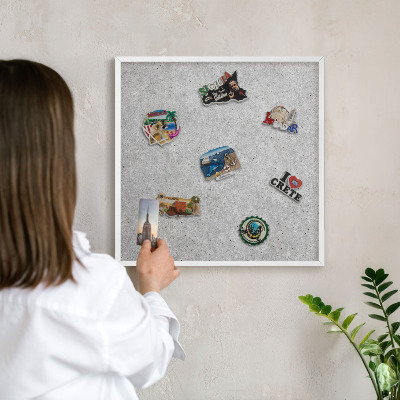Decorative magnet board with a white frame Gray texture