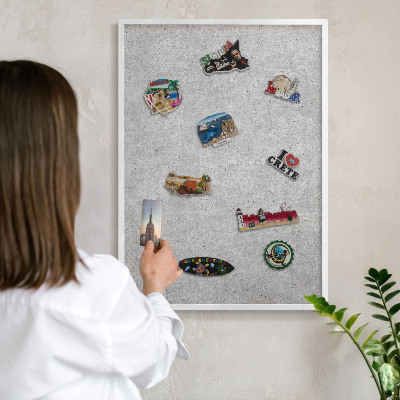 Decorative magnet board with a white frame Gray texture