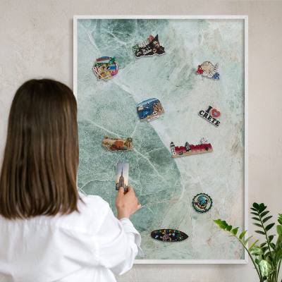 Magnetic board for travel magnets in a white frame Green textures