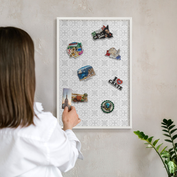 Magnetic board for travel magnets in a white frame Geometric symmetry