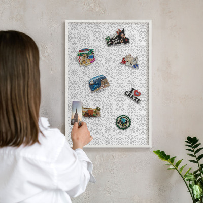 Magnetic board for travel magnets in a white frame Geometric symmetry