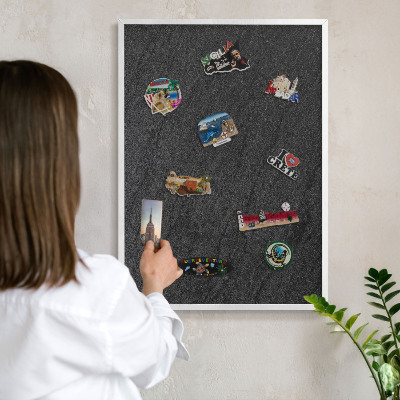 Decorative magnet board with a white frame Black texture