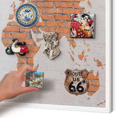 Magnetic board for travel magnets in a white frame Brick map