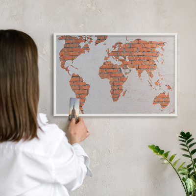 Magnetic board for travel magnets in a white frame Brick map