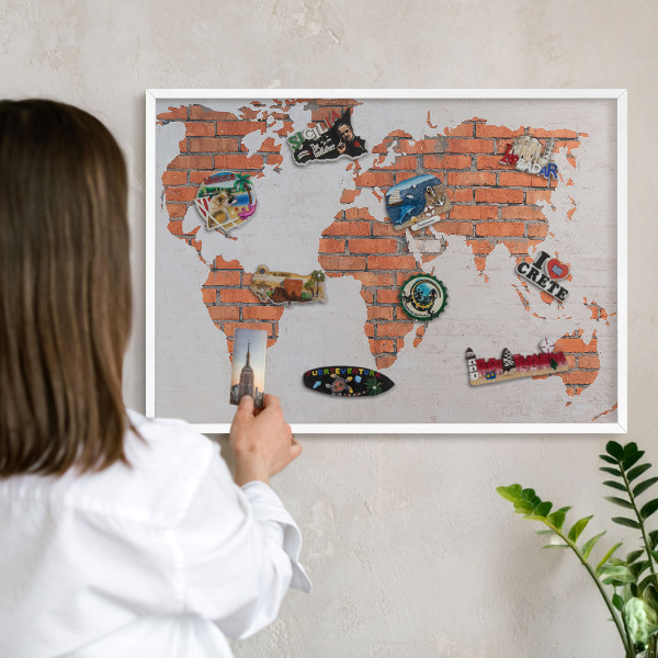 Magnetic board for travel magnets in a white frame Brick map