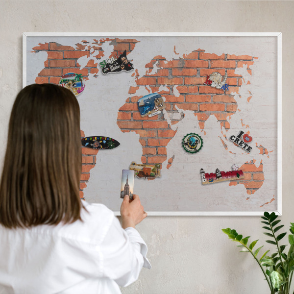 Magnetic board for travel magnets in a white frame Brick map