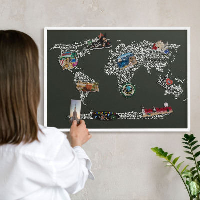 Magnetic board for travel magnets in a white frame Text map