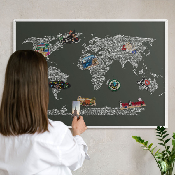 Magnetic board for travel magnets in a white frame Text map