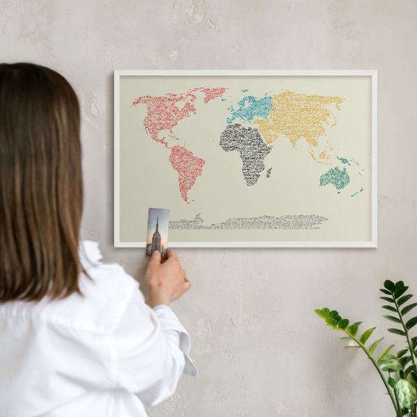 Decorative magnet board with a white frame World map