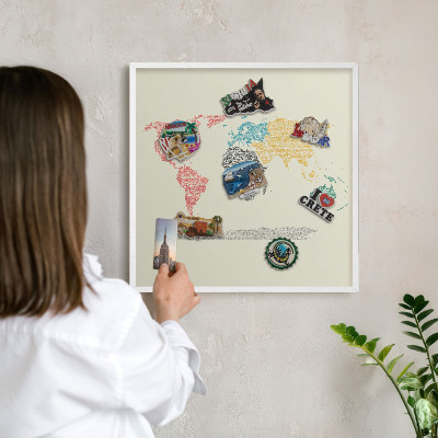 Decorative magnet board with a white frame World map