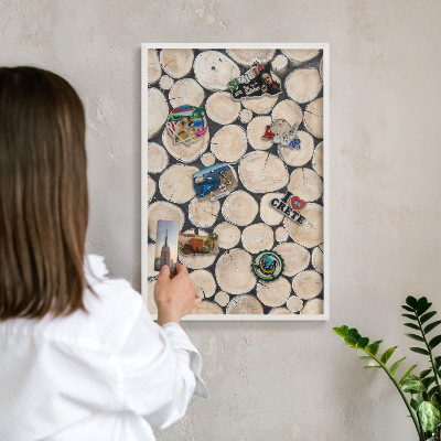 Magnetic board for travel magnets in a white frame Wooden texture