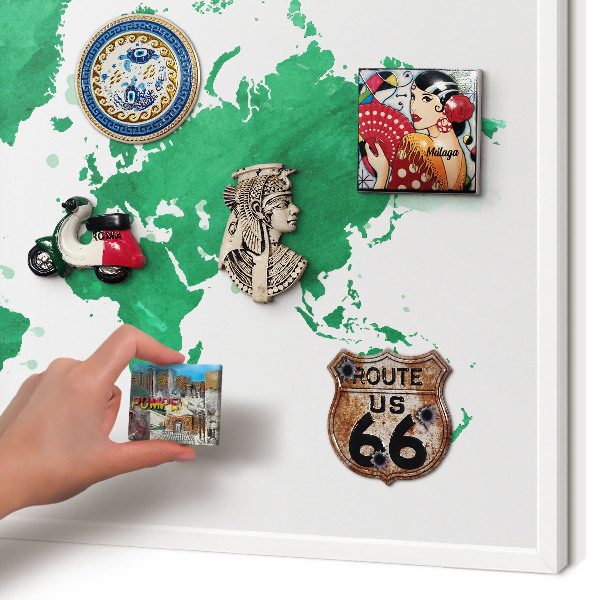 Magnetic board for travel magnets in a white frame Green map