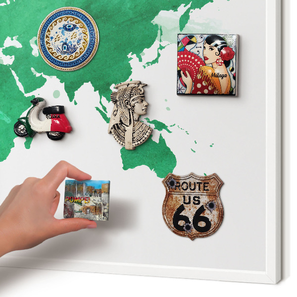 Magnetic board for travel magnets in a white frame Green map