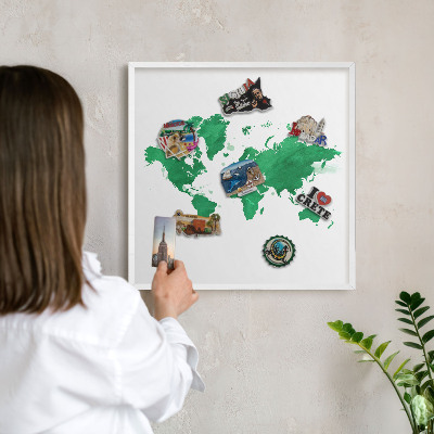 Magnetic board for travel magnets in a white frame Green map