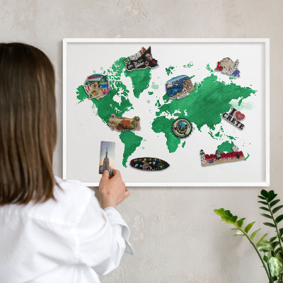 Magnetic board for travel magnets in a white frame Green map