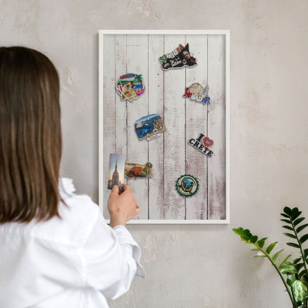 Decorative magnet board with a white frame Light wood