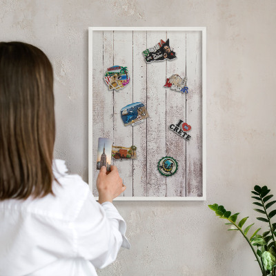 Decorative magnet board with a white frame Light wood